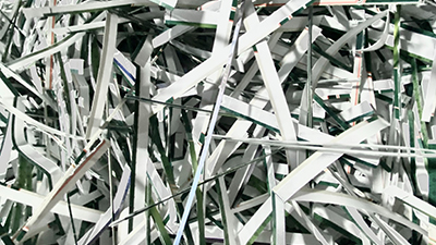 What are the security risks of in-office document shredding?